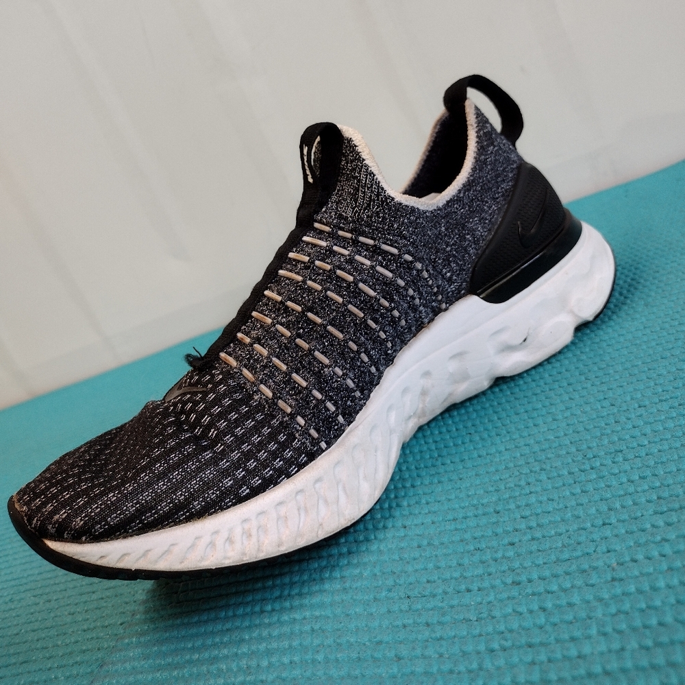 Nike Women’s Black and White Knit Slip-On Sneakers